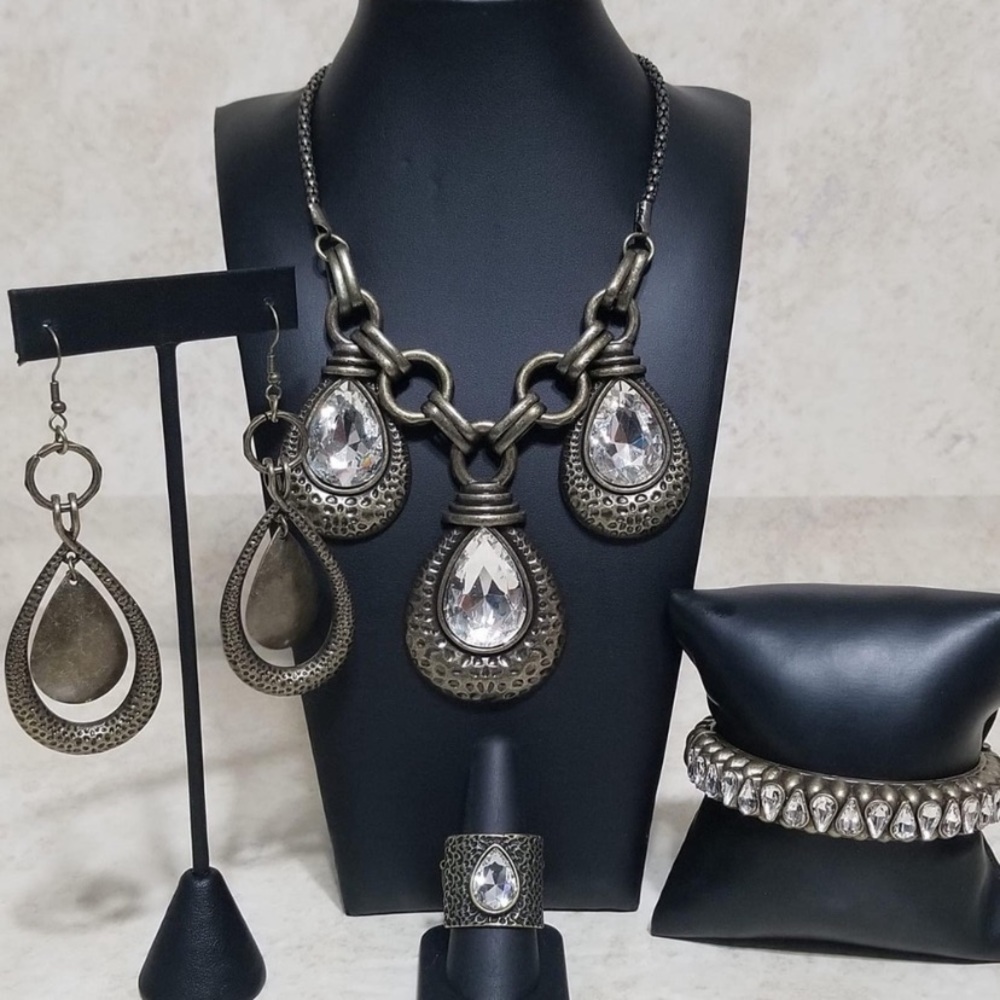 New.  4 pc Jewelry set.  Necklace earrings bracelet & ring.